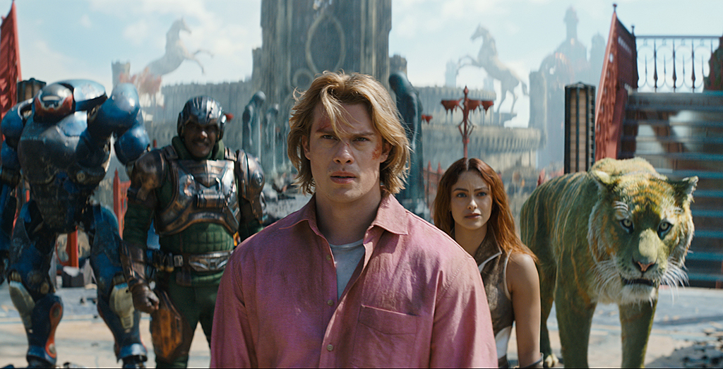 (l-r): Roboto (Kristen Wiig), Man At Arms (Idris Elba), Adam (Nicholas Galitzine), Teela (Camila Mendes) and Cringer in MASTERS OF THE UNIVERSE.